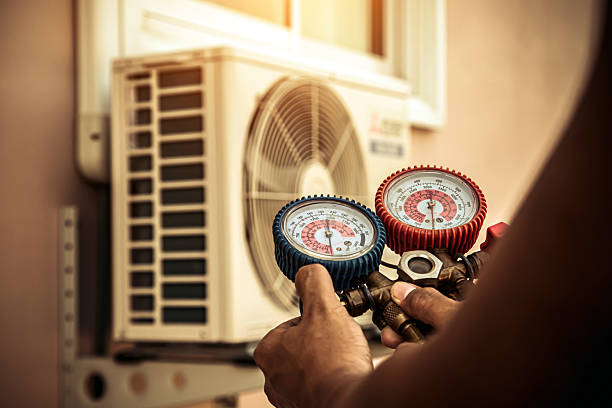 Professional Heat Pump Repair technician working in Newhall, CA